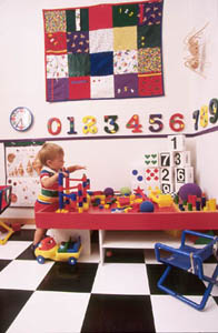 Nail boxes serve as corner seating and building blocks